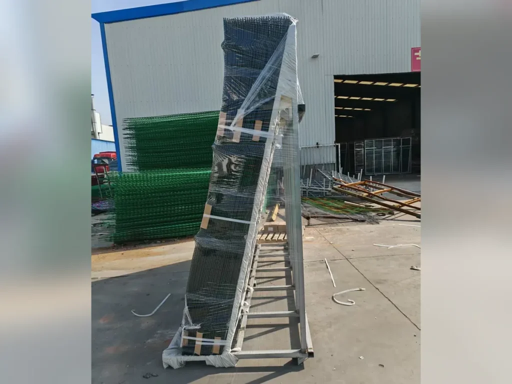 Panels stacked on a steel stillage and wrapped for sea freight