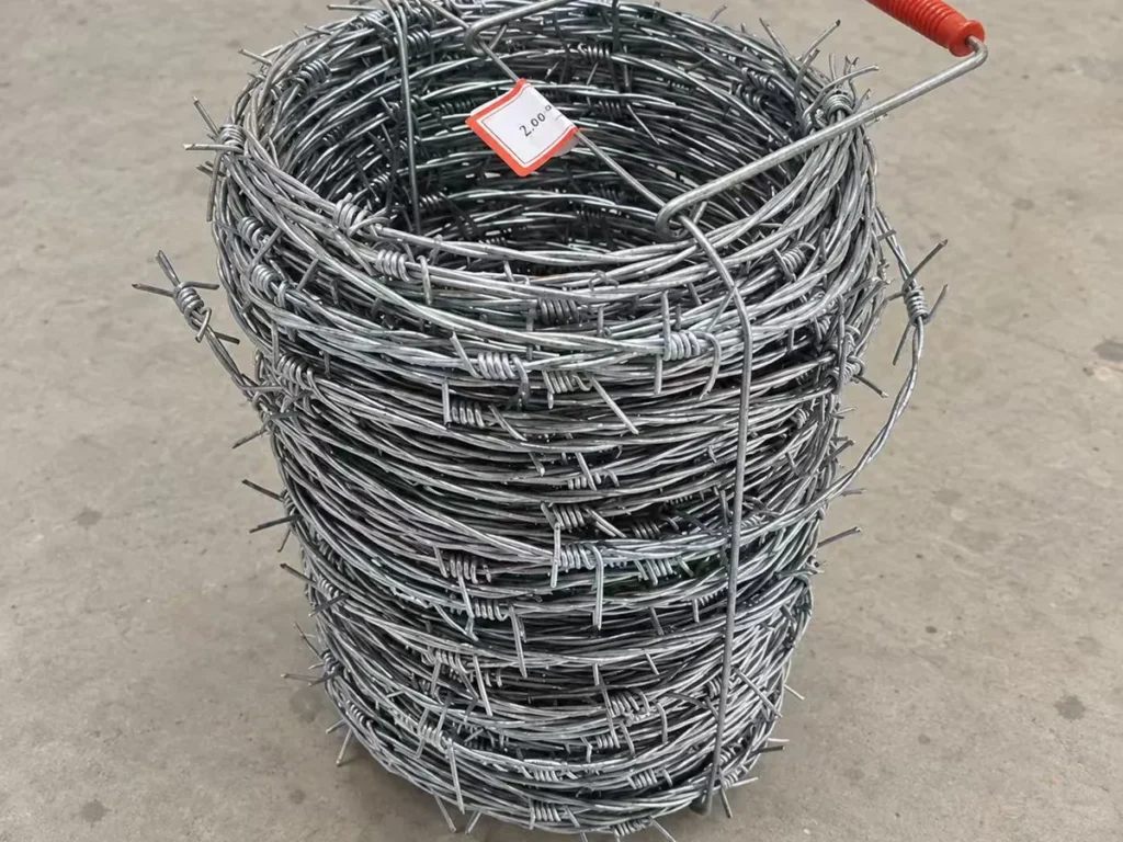 Galvanized barbed wire coil with carrying handle