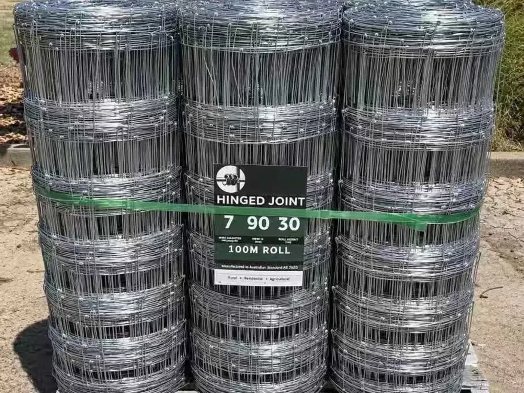 100 m cattle fence rolls strapped on a wooden pallet, labelled with specification