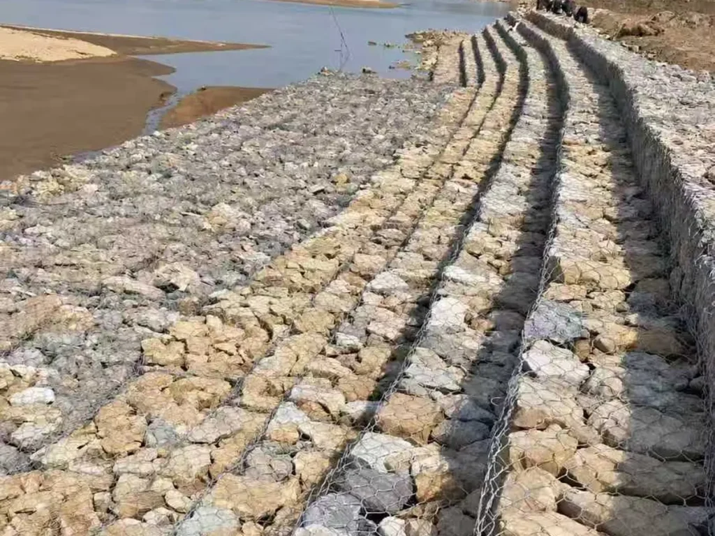 Rows of gabion boxes protecting a riverbank