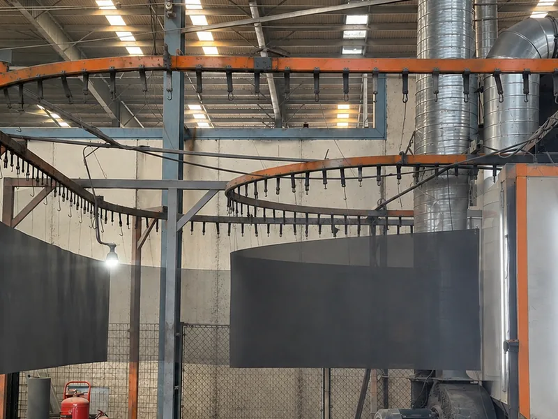 Window screen mesh on the powder coating line