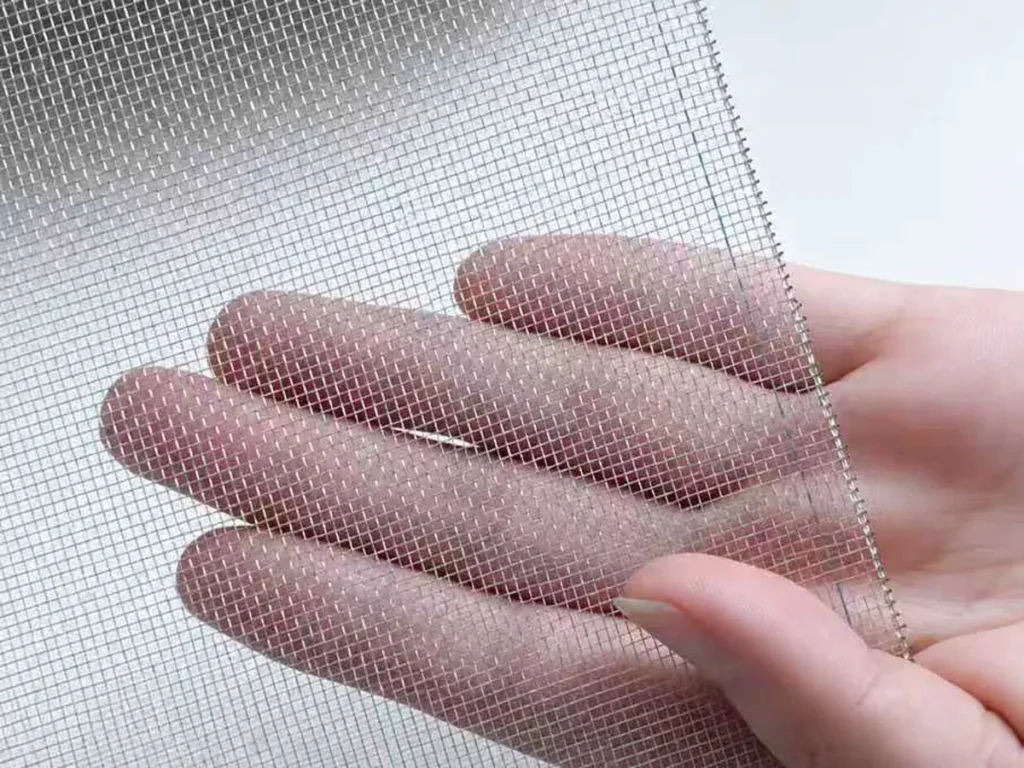 Fine stainless steel insect mesh held in hand