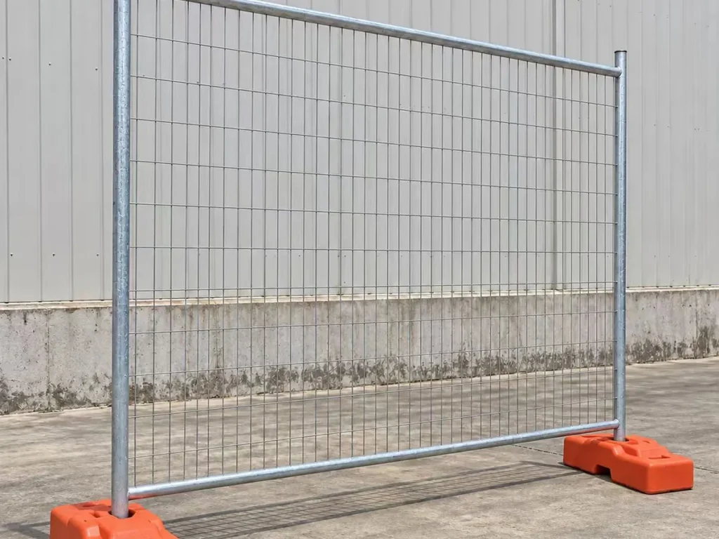 Galvanized temporary fence panel standing in two plastic feet